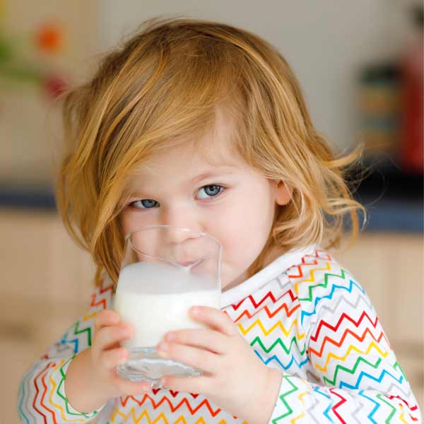 Child drinking formula